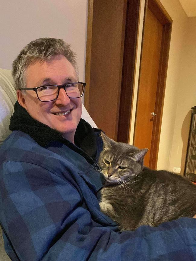 Darren with his cat in July 2024. Picture: Supplied