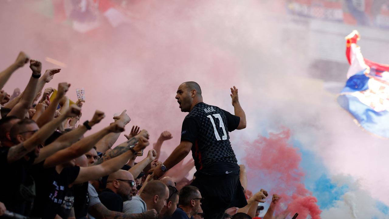 Supporters of Croatia cheer during the UEFA Euro 2024 Group B football match between Croatia and Albania. (Photo by Odd ANDERSEN / AFP)