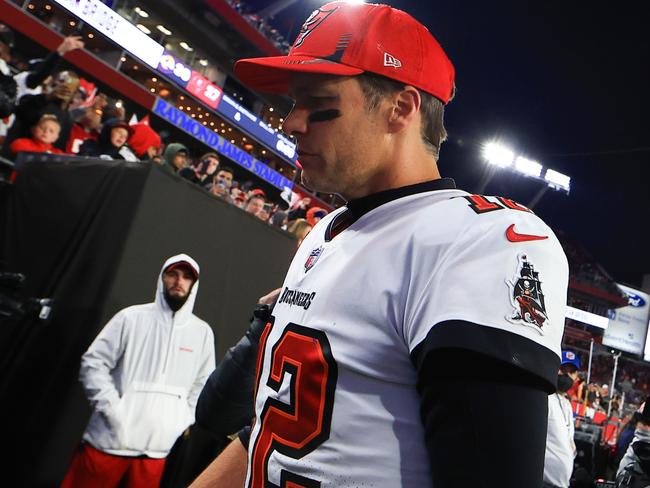 TAMPA, FLORIDA - JANUARY 23: Tom Brady #12 of the Tampa Bay Buccaneers reacts after being defeated by the Los Angeles Rams 30-27 in the NFC Divisional Playoff game at Raymond James Stadium on January 23, 2022 in Tampa, Florida. (Photo by Mike Ehrmann/Getty Images)