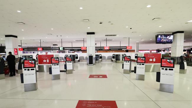 The Qantas check-in area was empty at Sydney International Airport last week. Picture: Getty