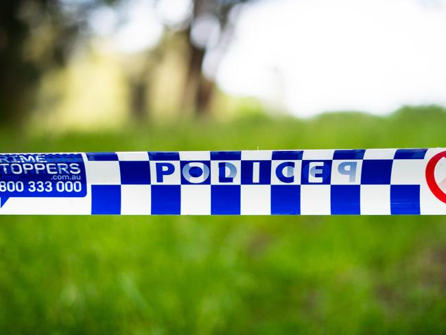 Police tape at the entrance to Shearer Park in Lansvale where 3 people tragically drowned on Saturday.Photo: Tom Parrish