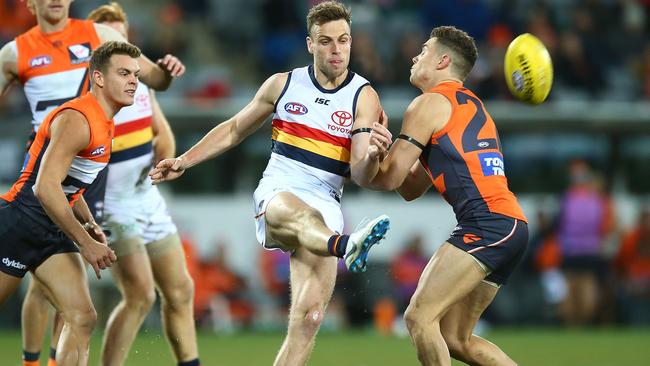 Adelaide’s Brodie Smith kicks ahead against the Greater Western Giants at UNSW Canberra Oval. Picture: Mark Nolan/Getty