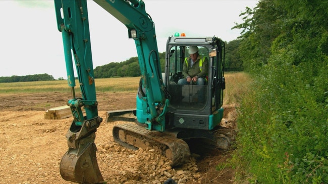 Jeremy Clarkson on a mini-excavator.