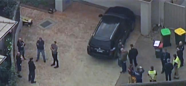 An aerial shot of officers at the house. Picture: Seven News