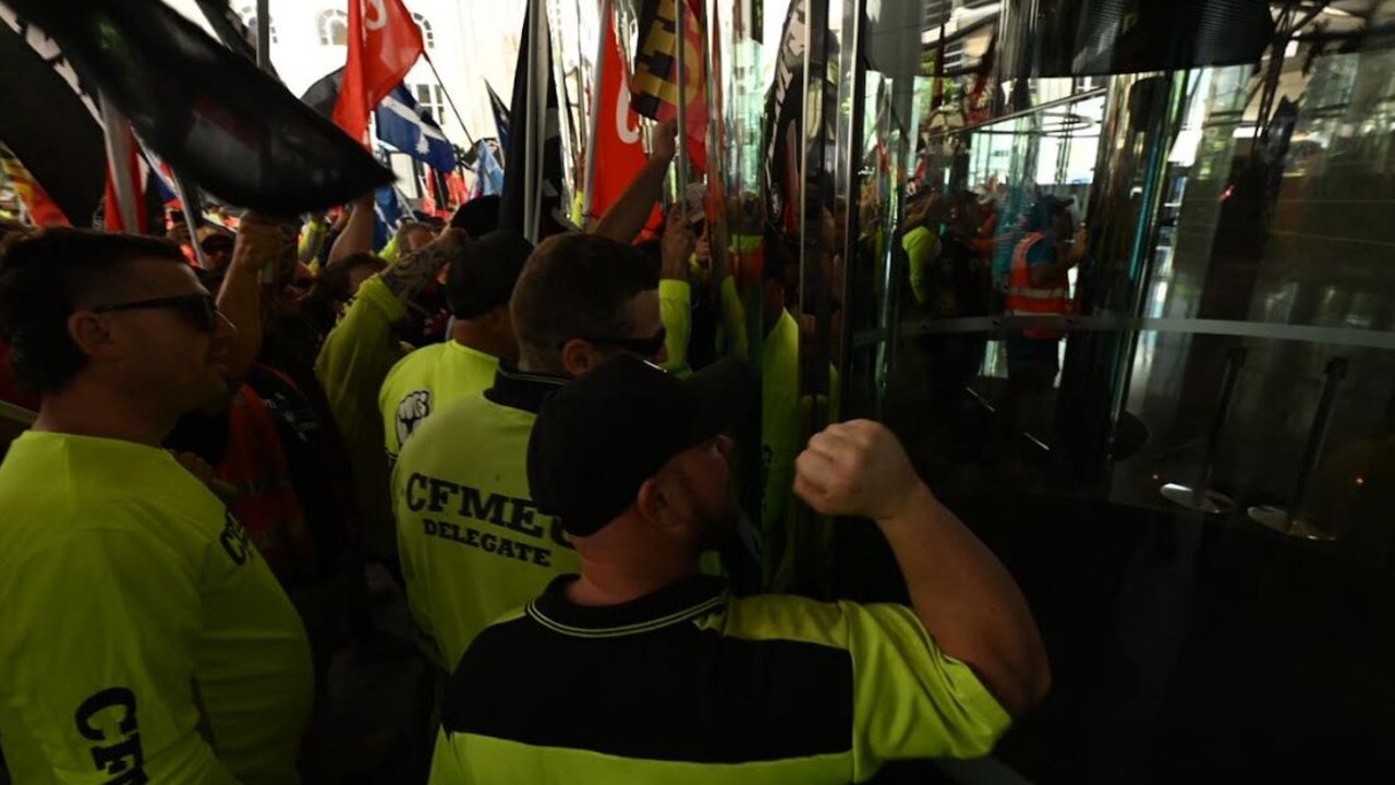 The protest march made its way to Waterfront Place, where the federal government's Brisbane offices are located.