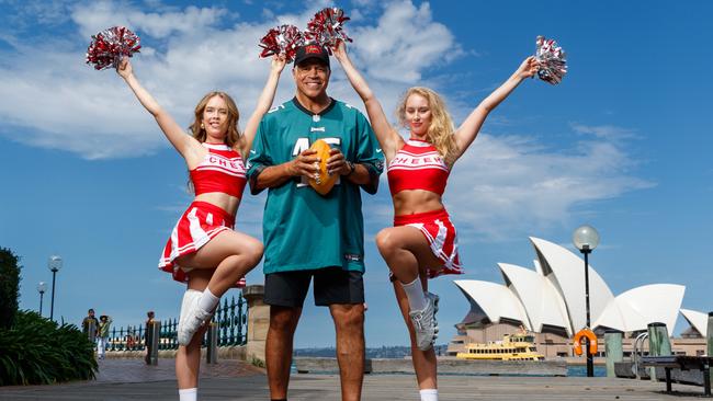 DAILY TELEGRAPH. Former NBL player and sports broadcaster Steve Carfino will MC the official Super Bowl event at Coogee on Monday, alongside cheerleaders Tegan Hannaford and Rylee Lister. Pictured with the Opera House at Sydney Harbour. Saturday 08/02/2025. Picture by Max Mason-Hubers