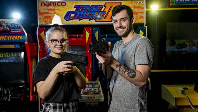 Keen gamers Georgia Mitchell and Jack Skinner are one of 48 who attended the last geek speed dating event at the Surfers Paradise arcade. Picture: Jerad Williams