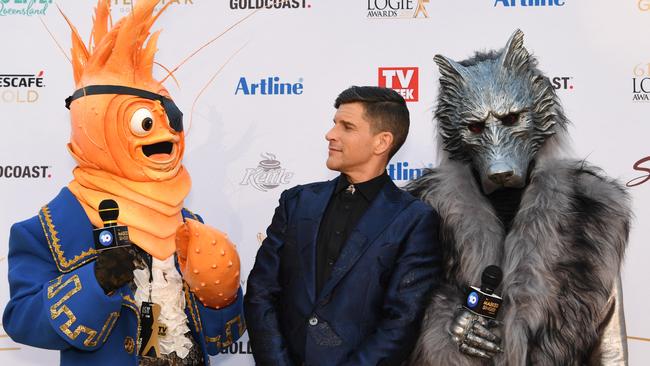 Osher Gunsberg (centre) at the Logies with characters from the 'The Masked Singer'. Picture: AAP Image/Dan Peled