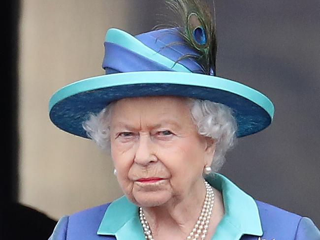 (FILE PIC) LONDON, ENGLAND - JULY 10: Queen Elizabeth II, Prince Harry, Duke of Sussex and Meghan, Duchess of Sussex on the balcony of Buckingham Palace as the Royal family attend events to mark the Centenary of the RAF on July 10, 2018 in London, England. (Photo by Chris Jackson/Getty Images)