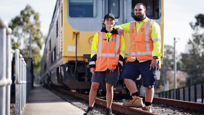 Senior shunters at Sydney Trains Cherrielyn Bonamis and Mohamed Elhallak wearing shorts whilst at work in Lidcombe maintenance yard today. Picture: Sam Ruttyn