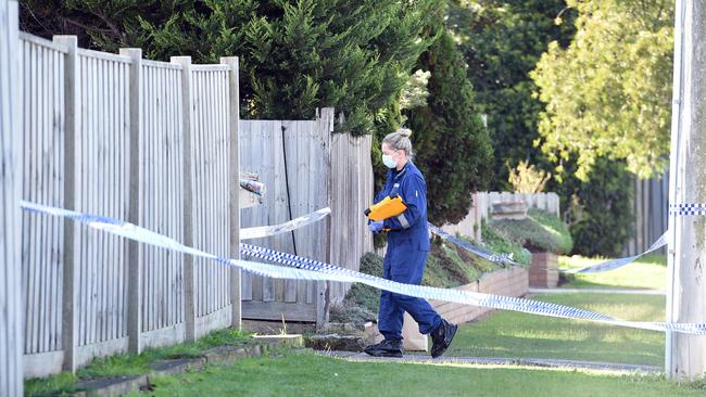 Police at the scene on Saturday morning. Picture: David Smith