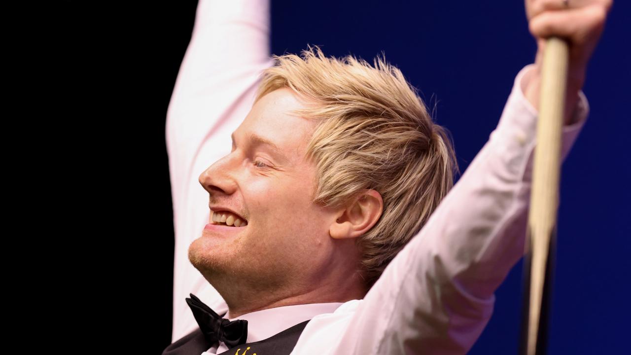 Neil Robertson of Australia celebrates after making a 147.