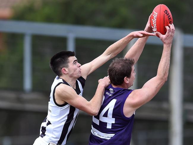 Dale Hehir attempts at spoil during his time at Scoresby. Picture: Steve Tanner