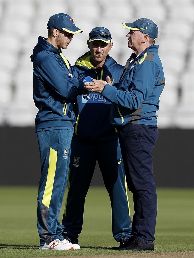 Brains trust … Australian coach Justin Langer is flanked by captain Tim Paine (left) and chairman of selectors Trevor Hohns at Old Trafford yesterday. Picture: Getty Images