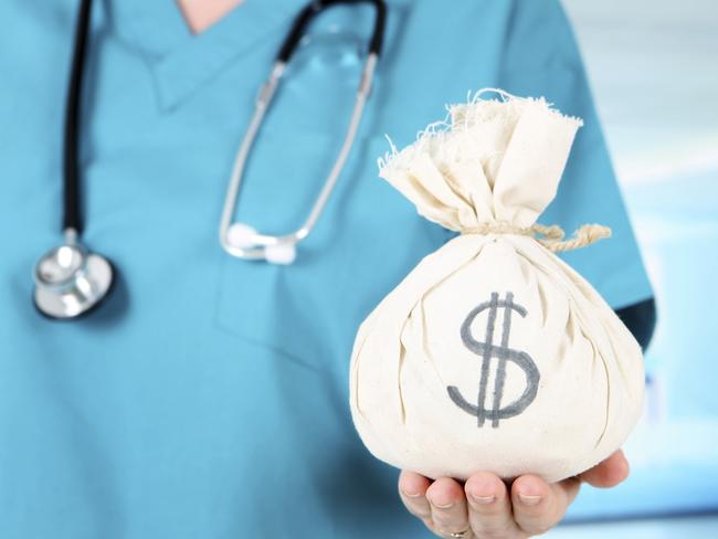 Nurse in hospital holding moneybag