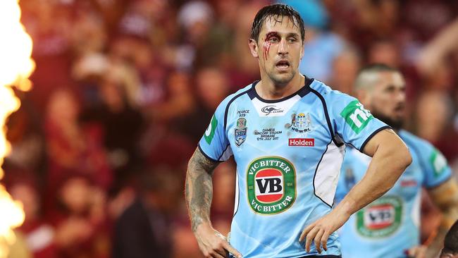 NSW's Mitchell Pearce looks on after a QLD try during Origin III this year. Photo: Brett Costello