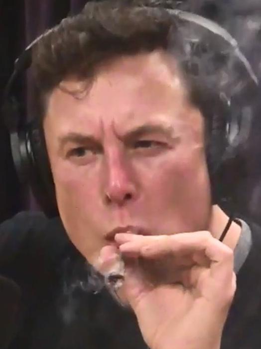 Elon Musk smoking ‘pot’ on the Joe Rogan Experience podcast in 2018.