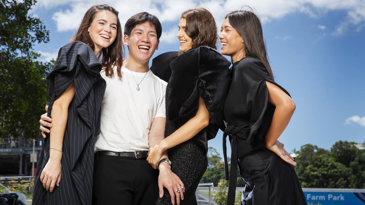 Rising Brisbane designer Joash Teo with models wearing his label, Joteo, Elly-Grace Rinaldis, Adelaide Sines, and Mereana Tupangaia. Picture: Lachie Millard