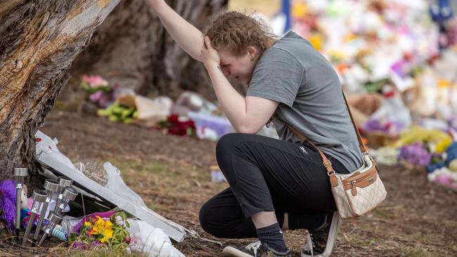 Mourners pay tribute to the children who died. Picture: Jason Edwards