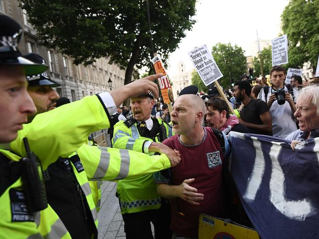 Violent protests at Downing Street after Prime Minister Theresa May was accused of not making an effort to meet with grieving families. Picture: Carl Court/Getty Images