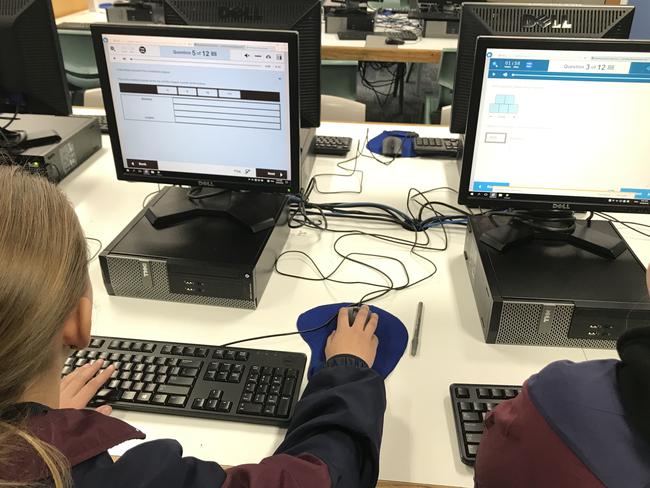 Year 7 students seeing how the new NAPLAN online setup operates.