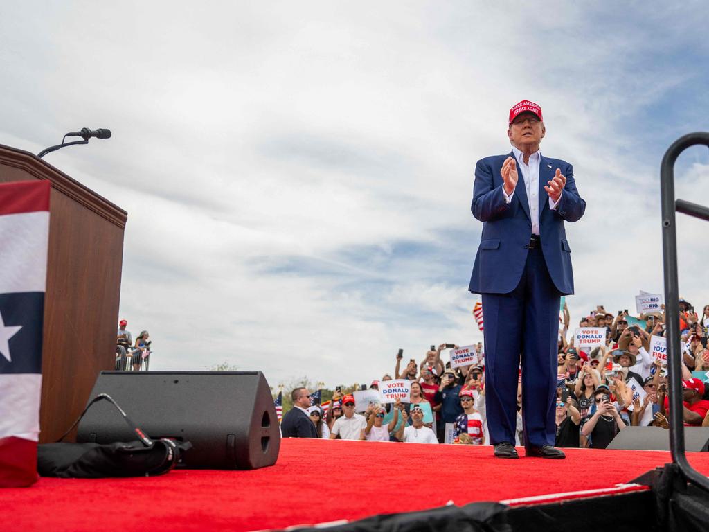 Former US president Donald Trump greets supporters upon arrival for his campaign rally at Sunset Park in Las Vegas, Nevada. Picture: AFP