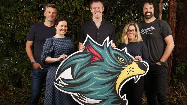 Adrian Bell Deputy Creative Director, Zoe Lovell Graphic Designer, Jack Riewoldt, Angie Miller Senior Designer, Jay Perrett Senior Art Director. Jack Riewoldt at The20 creative agency in Hobart with designers of the Tasmania Football Club devil logo. Picture: Nikki Davis-Jones