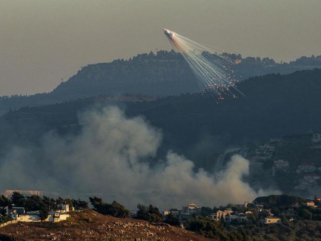 TOPSHOT - Smoke from Israeli bombardment billows in Kfarkila in southern Lebanon on July 12, 2024 amid ongoing cross-border tensions as fighting continues between Israel and Hamas in the Gaza Strip. (Photo by Rabih DAHER / AFP)