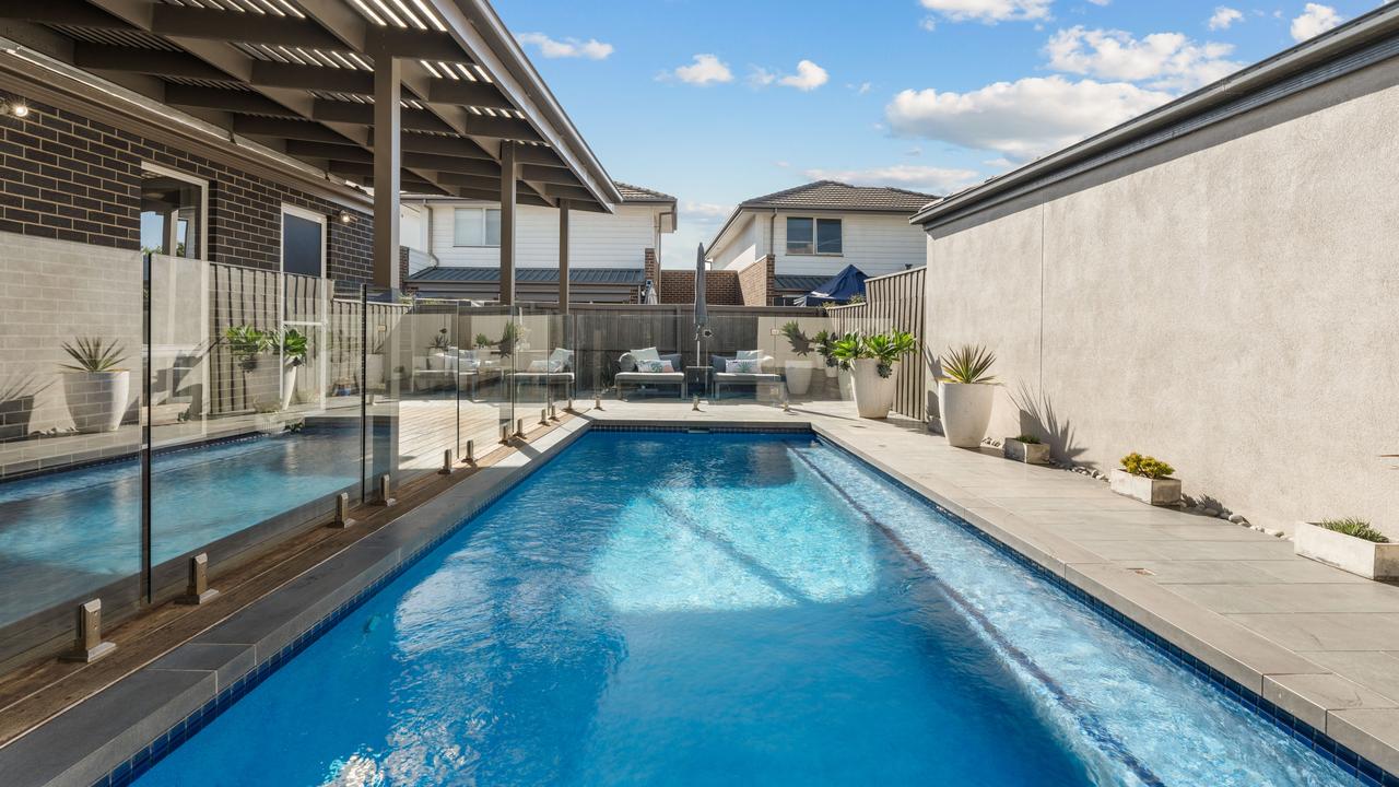 The Mulgrave house features an in-ground pool with an electric heat pump.