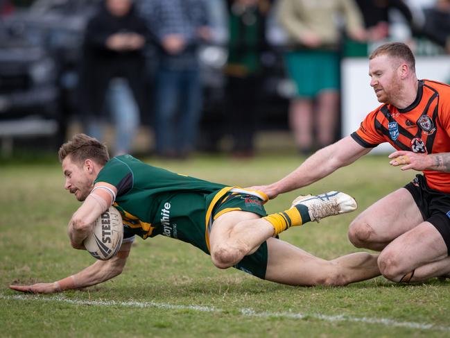 Mittagong’s Lleyton Wallace scores. News Local, Pictures by Julian Andrews.