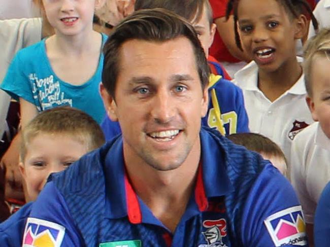 Mitchell Pearce and Lachlan Fitzgibbon with the kids at Gillieston Primary School today. Picture: Newcastle Knights