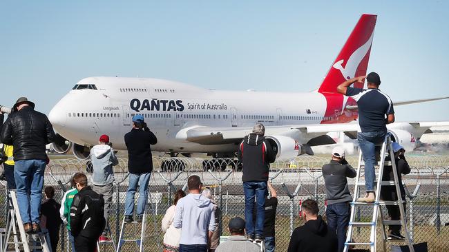 Plane spotters gather for the last flight of the 747 at Brisbane Airport. Photographer: Liam Kidston.