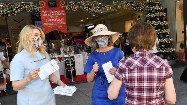 Nicola Spurrier hands out masks in Adelaide. Picture: Keryn Stevens.