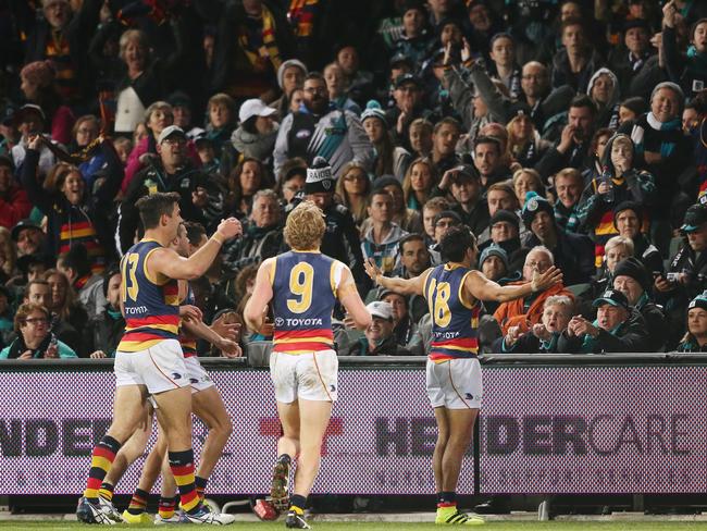 Eddie Betts gestures reacts to Port fans after kicking his fifth goal during Showdown 41. Picture: AAP