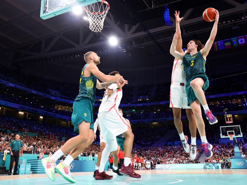 Team Australia’s Josh Giddey drives to the basket during the men’s group A match against Team Canada. Picture: Gregory Shamus/Getty Images
