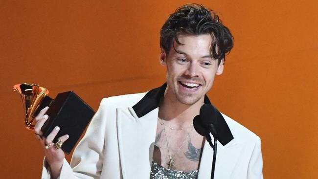 English singer-songwriter Harry Styles accepts the award for Album Of The Year for "Harryâs House" during the 65th Annual Grammy Awards at the Crypto.com Arena in Los Angeles on February 5, 2023. (Photo by VALERIE MACON / AFP)