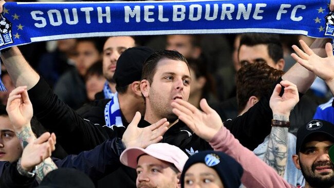 South Melbourne fans cheers their team on.