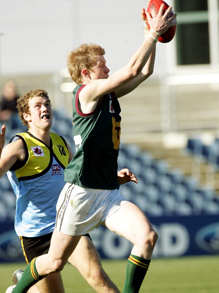 Jack Riewoldt marks in an under-18 game for Tasmania.