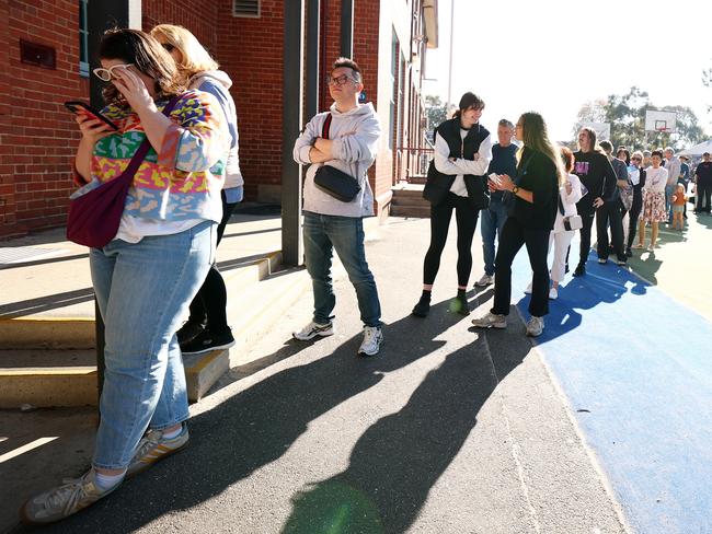 People line up to vote at Kew Primary School in the seat of Kooyong. Picture: Getty Images