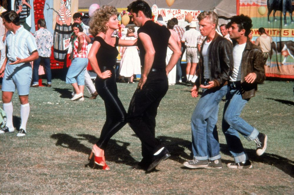 Olivia Newton-John and John Travolta in a scene from Grease. Image credit: supplied