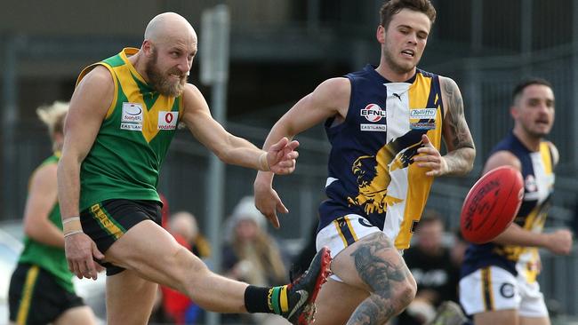 EFL: Bayswater’s Benjamin Searle gets a kick away. Picture: Hamish Blair