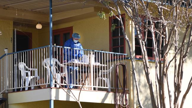 Investigators at the site of an alleged murder in Brae St South Rockhampton