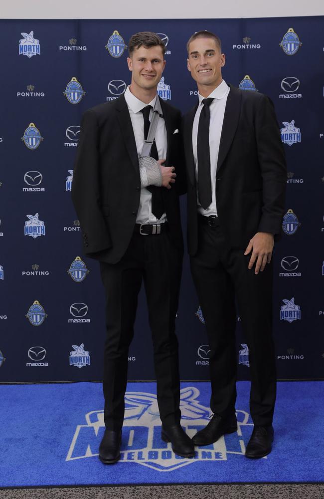 Charlie Comben (left) was in a sling at the Roos best-and-fairest.