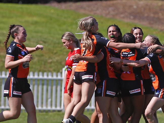 DAILY TELEGRAPH 15TH APRIL 2022Pictured at Ringrose Park in Wentworthville in western Sydney are players from Wests Tigers celebrate winning their games against the Illawarra Steelers in the Harvey Norman Tarsha Gale Cup.Picture: Richard Dobson