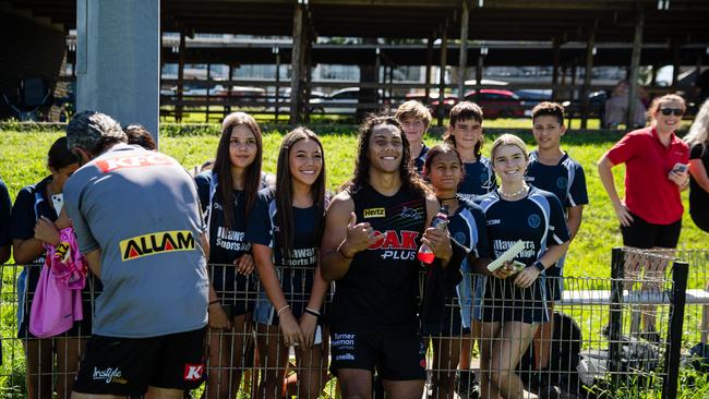 The Penrith squad spent some time with the locals during their mid-season trip to Kiama. Credit: Supplied.