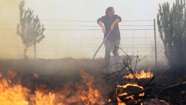 Many residents have stayed to defend their properties. Picture: Gary Ramage