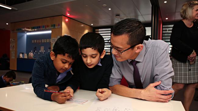 Woo now leads a team of NSW Education Department trainers who are embedded in schools to improve the skills of existing teachers. Picture: Adam Yip