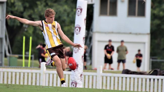 Jordie Chambers of Padua College delivers possession down the field.