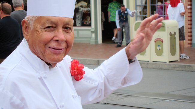 Old and loving it: Oscar Martinez, 77, greets diners at the Carnation Cafe at Disneyland, California. Picture: Matt Sedensky/AP