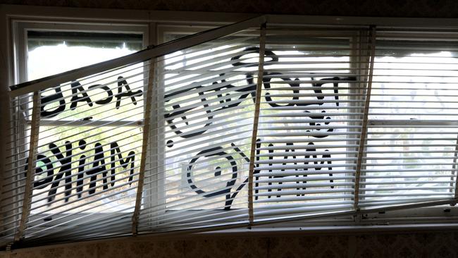 Graffiti on the windows. Picture: Andrew Henshaw